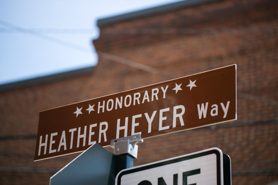 <p>A street sign renamed in honor of Heather Heyer is seen Aug. 10, 2018 in Charlottesville, Va., a year after she was killed while protesting a Unite the Right rally. (Photo: Logan Cyrus/AFP/Getty Images) </p>