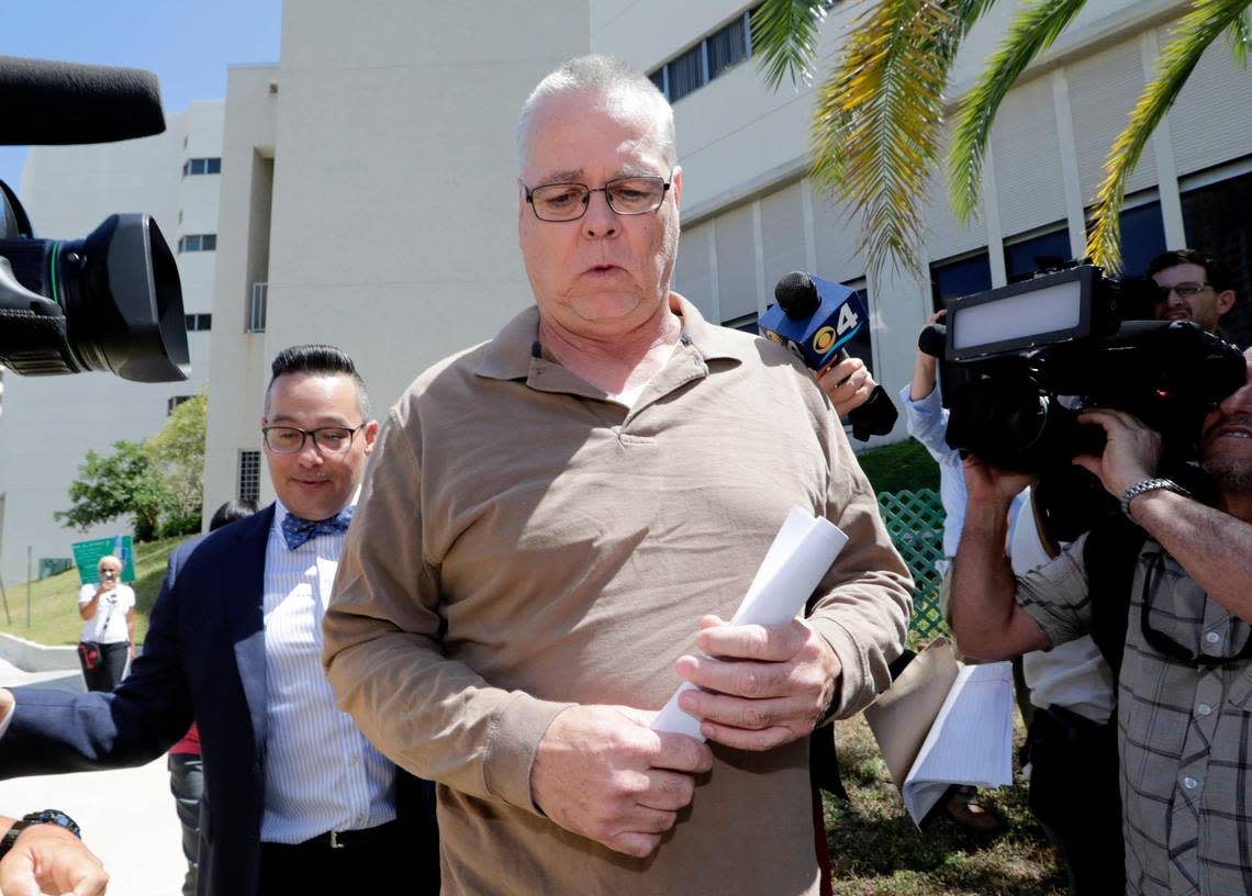 Scot Peterson leaves the Broward County Jail after posting bond on June 6, 2019, in Fort Lauderdale, Fla. Peterson, who was the assigned resource officer at Marjory Stoneman Douglas High School, has been charged with 11 criminal counts after failing to confront the gunman in the Parkland school massacre. His attorney Joseph DiRuzzo is at left.