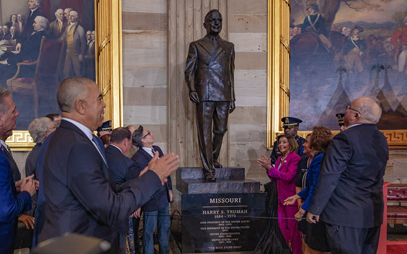 Speaker Nancy Pelosi (D-Calif.) helps unveil a Statue of former President Harry S. Truman