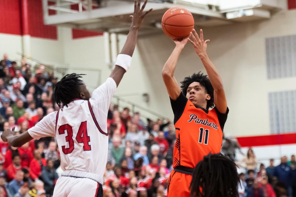 Central York's Doug Layer sinks a step-back two during a PIAA Class 6A basketball semifinal against Reading at Warwick High School on March 19, 2024, in Lititz. The Panthers won, 79-65, to advance to the championship game.