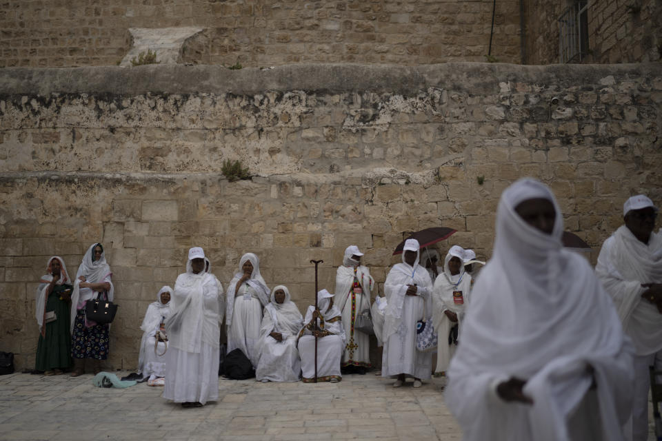 Ethiopian Orthodox Christian worshippers attend the Washing of the Feet ceremony at the Ethiopian monks' village Deir Al-Sultan, located on the rooftop of the Church of the Holy Sepulchre where many Christians believe Jesus was crucified, buried and rose from the dead, in the Old City of Jerusalem, Thursday, May 2, 2024. (AP Photo/Leo Correa)