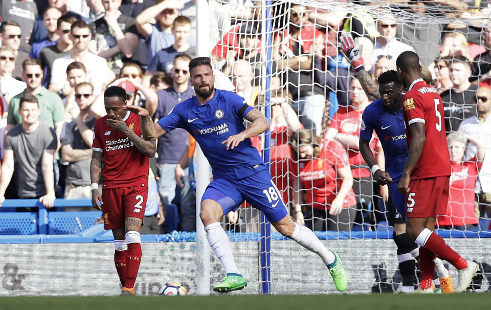 Chelsea’s Olivier Giroud celebrates after scoring his side’s opening goal during the English Premier League soccer match between Chelsea and Liverpool at Stamford Bridge stadium in London, Sunday, May 6, 2018. (AP Photo/Kirsty Wigglesworth)