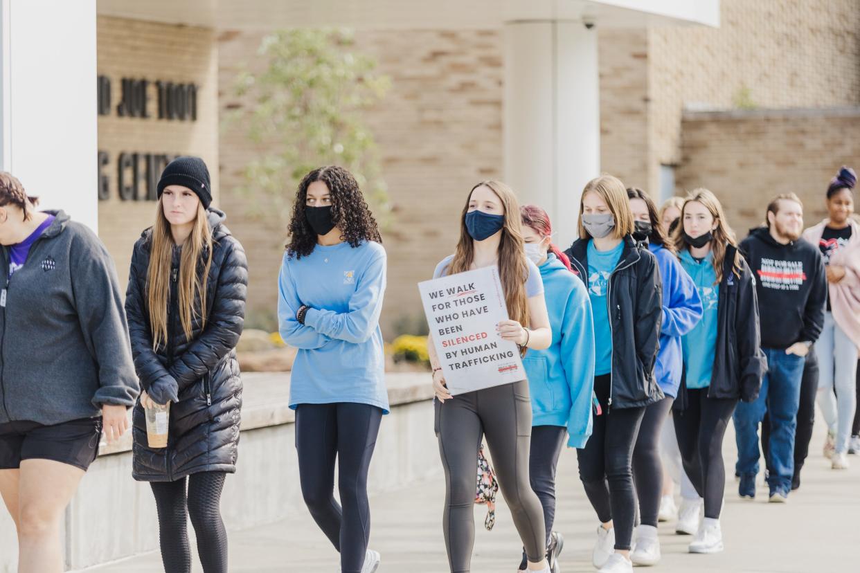 Young women take part in the 2021 Not for Sale walk to highlight the issue of human trafficking and sextortion at Walsh University. The school plans another event on Sept. 30, with Ohio Attorney General Dave Yost giving the keynote address.