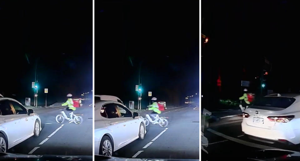 Screenshots from a video of a bike rider delivering food riding carelessly through an intersection.