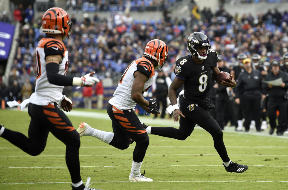 Can’t catch this: Lamar Jackson ran for 117 yards and passed for 150 in leading the Ravens past the Bengals on Sunday. (AP)