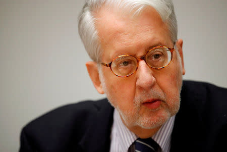 FILE PHOTO: Paulo Pinheiro, chairman of the U.N. Commission of Inquiry on Syria, attends the launch of a report on sexual and gender-based violence in Syria at the United Nations office in Geneva, Switzerland, March 15, 2018. REUTERS/Denis Balibouse/File Photo