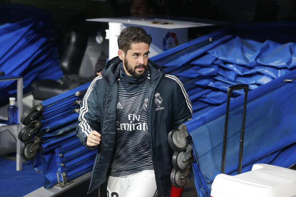 Real Madrid's Isco enters from the tunnel to sit on the substitutes bench again before a Spanish La Liga soccer match between Real Madrid and Valencia at the Santiago Bernabeu stadium in Madrid, Spain, Saturday, Dec. 1, 2018. (AP Photo/Paul White)