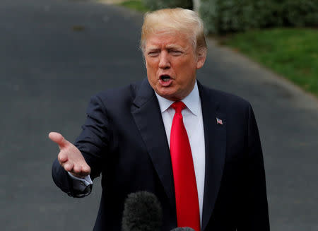 FILE PHOTO: U.S. President Donald Trump speaks to the media before departing the White House for a trip to New York, in Washington, U.S. May 23, 2018. REUTERS/Carlos Barria/File Photo