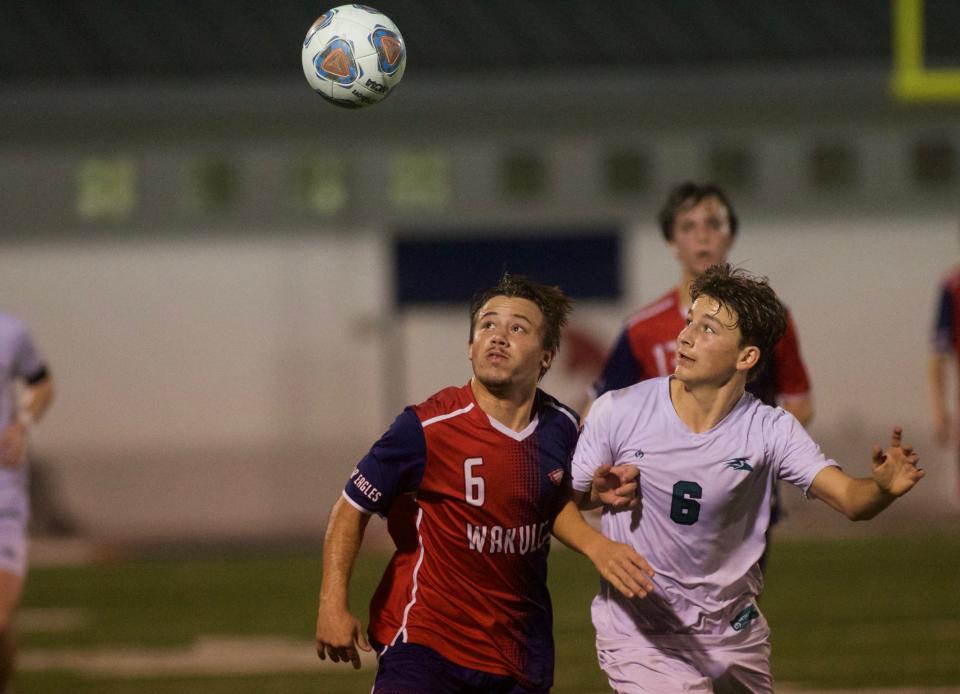 Wakulla senior Dylan Gorman (6) battles for possession in the Class 4A District 1 championship between Wakulla and South Walton on Feb. 2, 2023, at Wakulla High School. The War Eagles won, 1-0.
