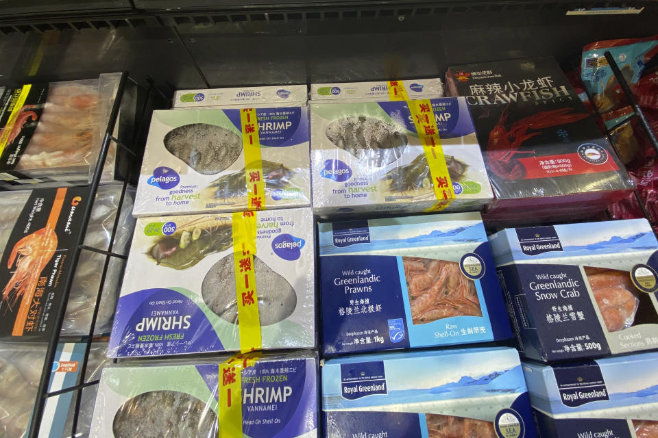 Imported frozen shrimps are displayed at a supermarket in Beijing, Friday, Nov. 20, 2020. China has stirred controversy with claims it has detected the coronavirus on packages of imported frozen food. (AP Photo/Ng Han Guan)