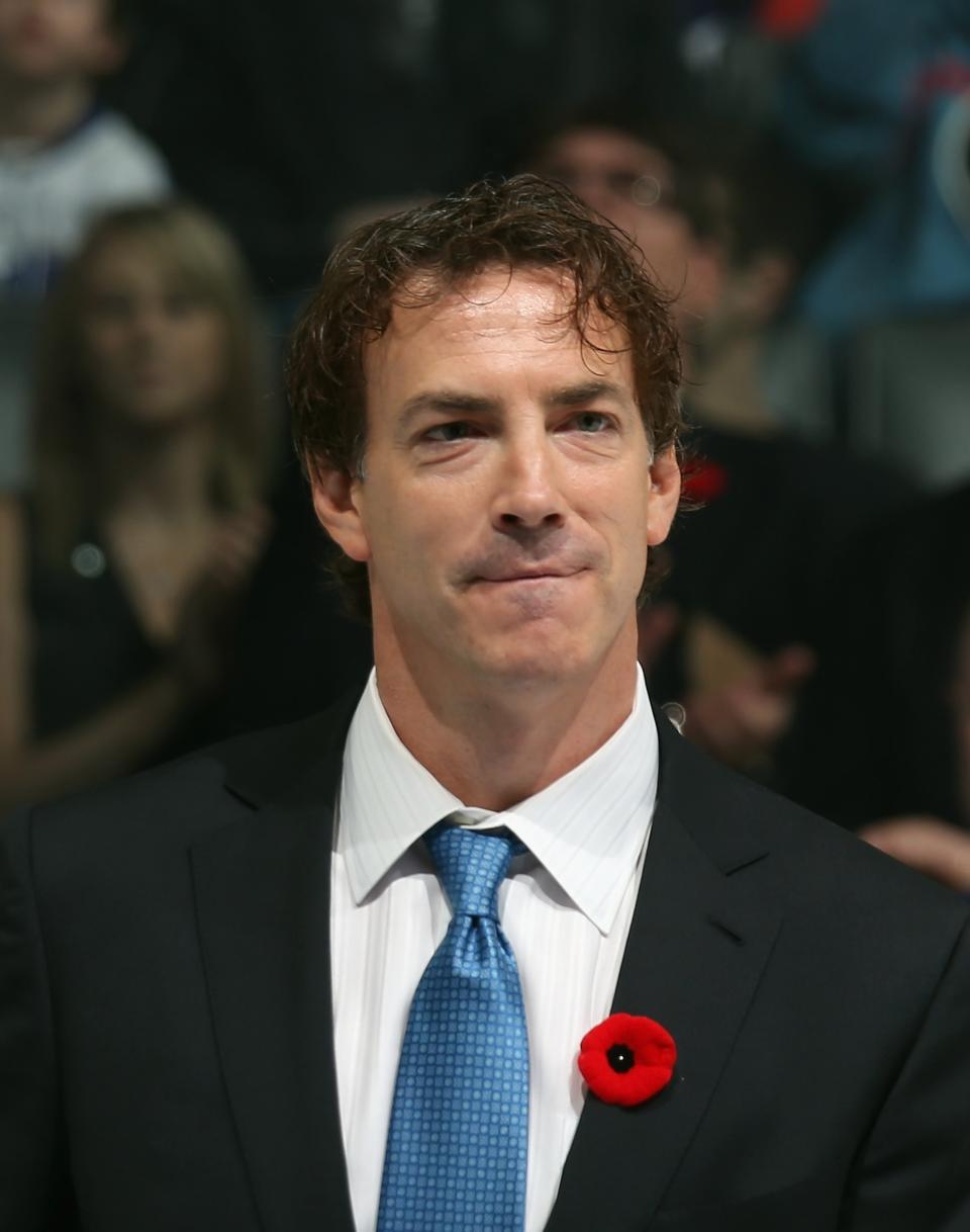 TORONTO, ON - NOVEMBER 11: Joe Sakic is presented with his Hall of Fame jacket prior to the Hockey Hall of Fame Legends Game at the Air Canada Centre on November 11, 2012 in Toronto, Canada. Sakic will be inducted into the Hockey Hall of Fame at a ceremony at the Hall on November 12. (Photo by Bruce Bennett/Getty Images)