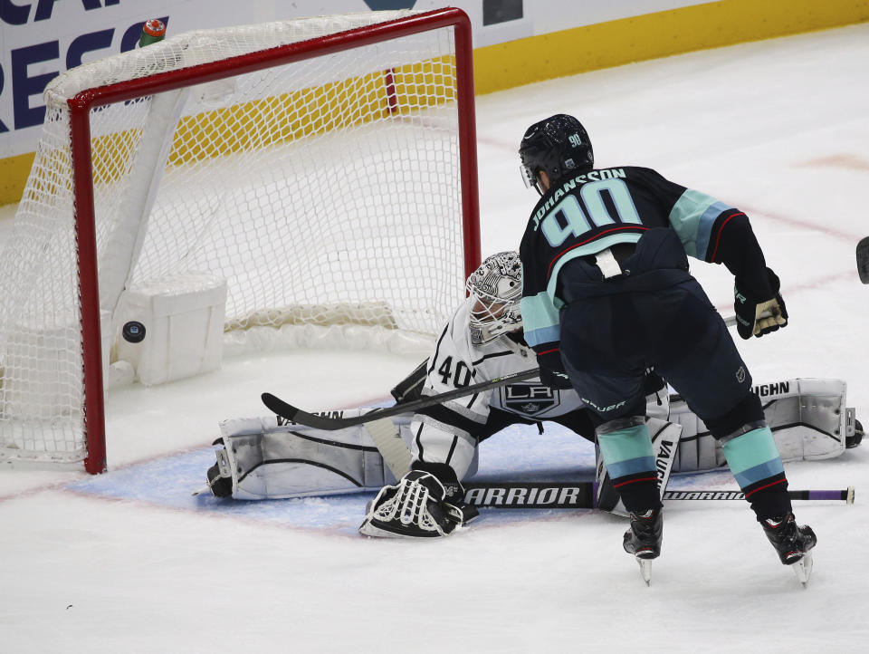 Seattle Kraken left wing Marcus Johansson (90) scores against Los Angeles Kings goaltender Cal Petersen (40) during the second period of an NHL hockey game, Saturday, Jan. 15, 2022, in Seattle. (AP Photo/Lindsey Wasson)