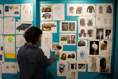 An employee looks at images on a board at the offices of StemRad, developers of new protective vest, Astrorad, in Caesarea, Israel February 23, 2017. Picture taken February 23, 2017. REUTERS/Amir Cohen