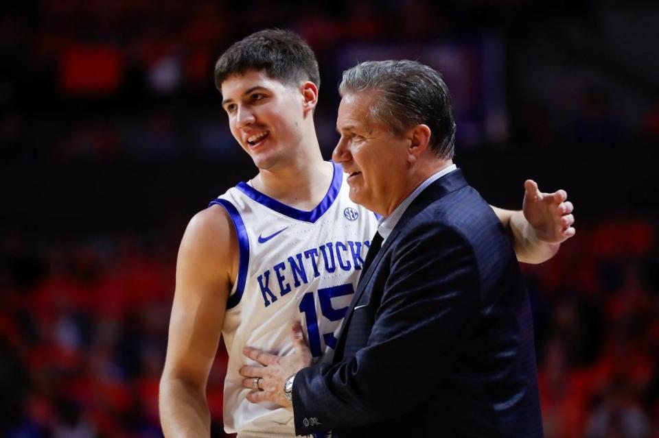 Kentucky guard Reed Sheppard talks to head coach John Calipari in between plays against Florida. Calipari’s team this season has a wide variety of players able to score.