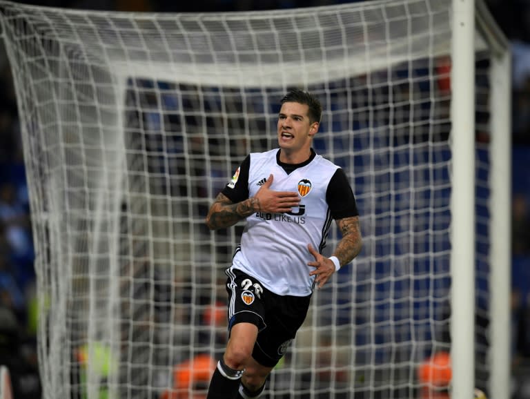 Valencia's forward Santi Mina celebrates a goal against Espanyol at the RCDE Stadium in Cornella de Llobregat on November 19, 2017