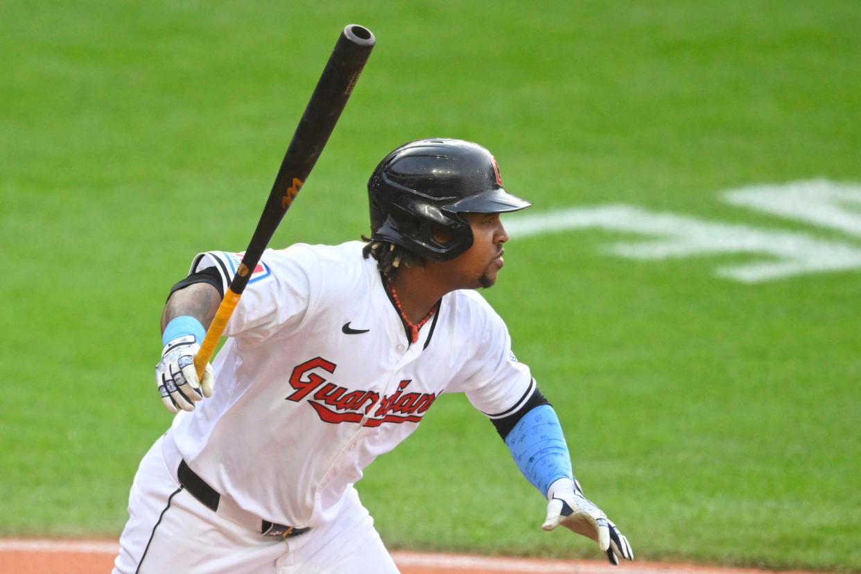 Cleveland Guardians' Jose Ramirez (11) watches his two-run single against the Detroit Tigers on Tuesday in Cleveland.