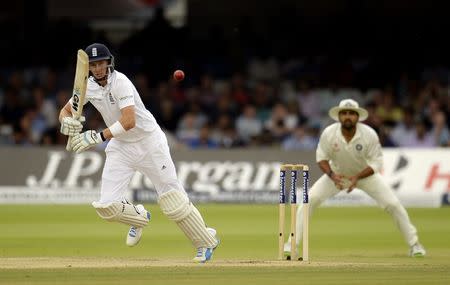 England's Joe Root hits out during the second cricket test match against India at Lord's cricket ground in London July 21, 2014. REUTERS/Philip Brown