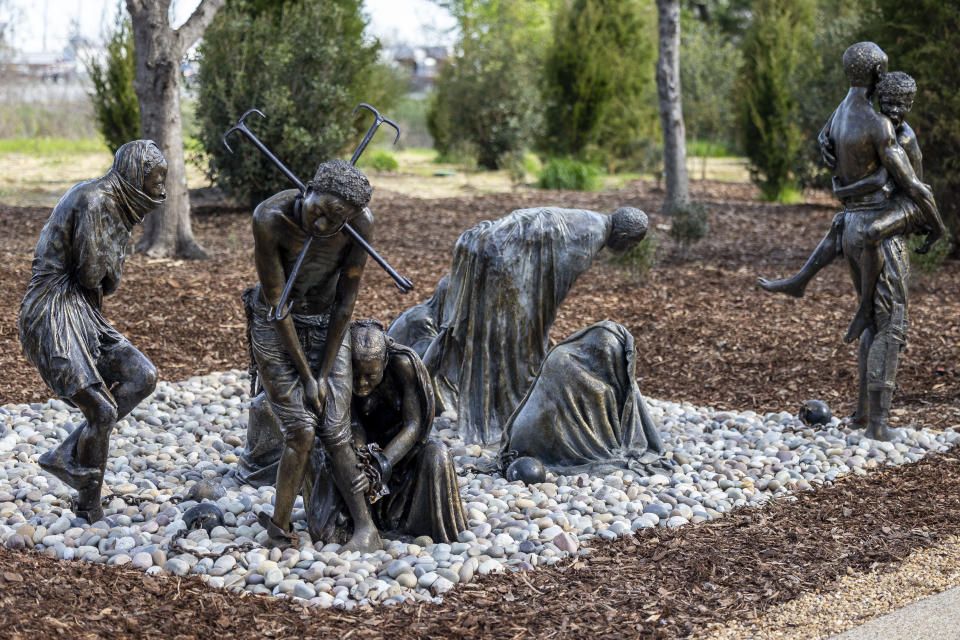 A sculpture named "We Am Very Cold" by Kwame Akoto-Bamfo, bronze, 2023, is seen during a media tour of Equal Justice Initiative's new Freedom Monument Sculpture Park, Tuesday, March 12, 2024, in Montgomery, Ala. (AP Photo/Vasha Hunt)