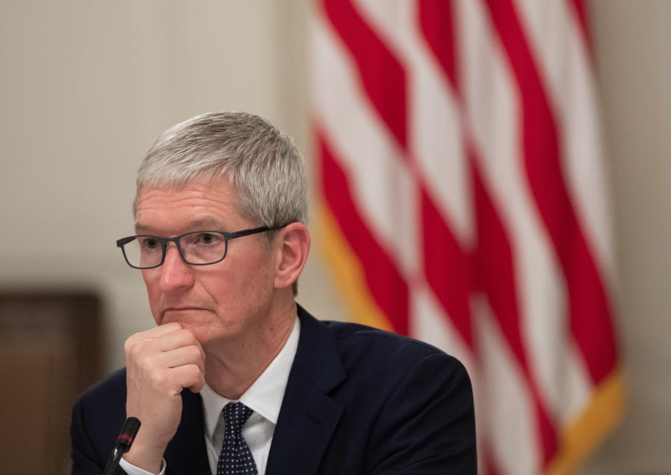 Apple CEO Tim Cook attends the first meeting of the American Workforce Policy Advisory Board with US President Donald Trump in the State Dining Room of the White House in Washington, DC, March 6, 2019. (Photo by SAUL LOEB / AFP)        (Photo credit should read SAUL LOEB/AFP/Getty Images)