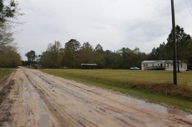 Nopalito Road in Nicholls, Ga., is a dirt road with at least four homes linked to Patricio and other family members.