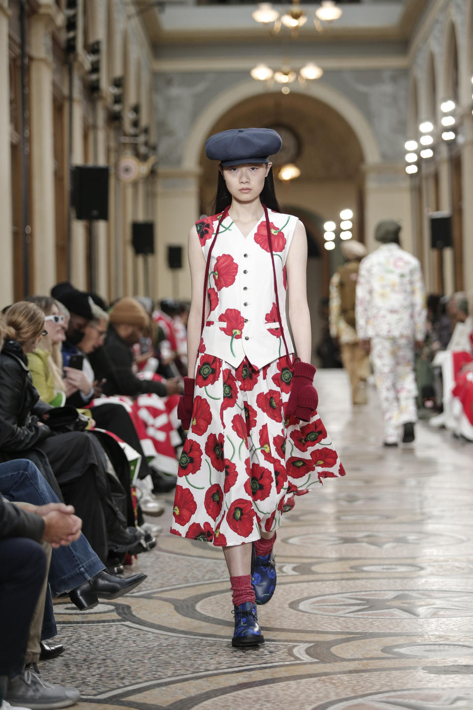 A model wears a creation for the Kenzo fall-winter 22/23 men's collection, in Paris, Sunday, Jan. 23, 2022. (AP Photo/Lewis Joly)