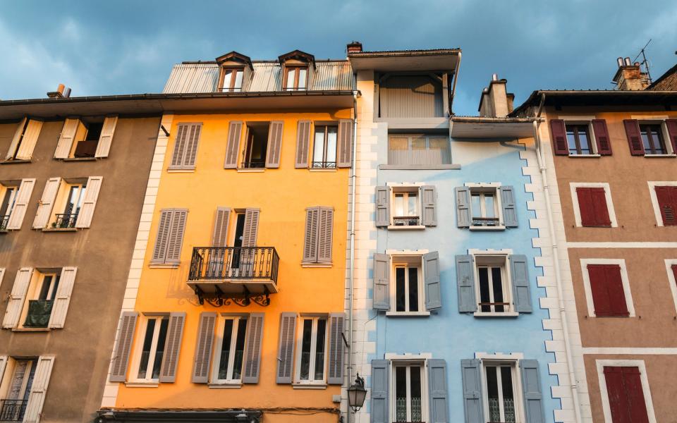 Colourful buildings in Barcelonnette - Getty