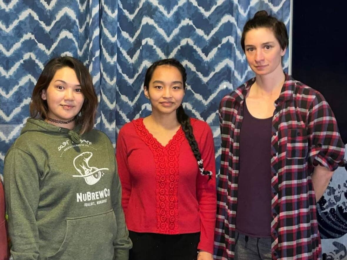 Meagan Akumalik Netser, Leonie Sammurtok and Em van der Kamp are three of the organizers of Saturday's mental health rally in Rankin Inlet, Nunavut. (Submitted by Meagan Akumalik Netser - image credit)