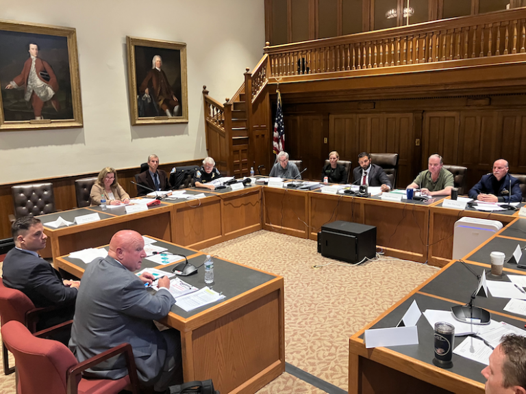 New Hampshire Liquor Commission Chairman Joseph Mollica addresses members of a study commission looking into how to legalize cannabis in New Hampshire with state-controlled retail.