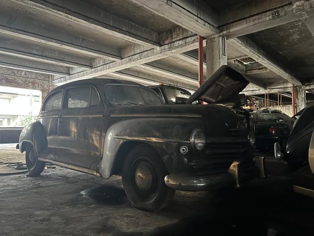 Old Car in a Garage Rug by moonfluff