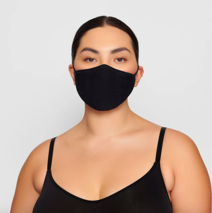 Adult Seamless Knit Face Mask in Onyx. Image via skims.com