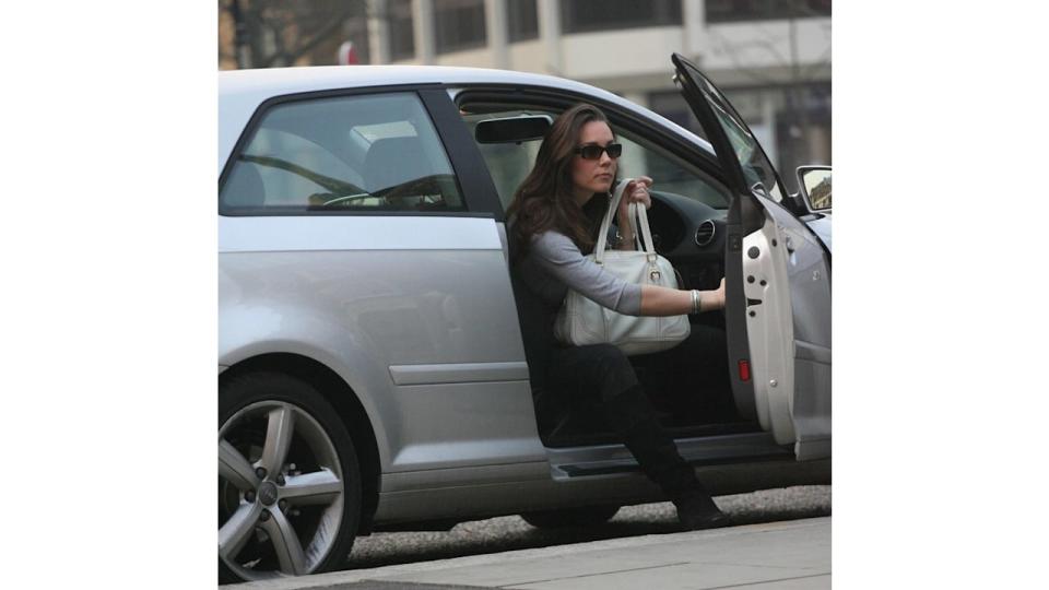  Kate Middleton stops at Starbucks for a take-out coffee on her way to work in her new car London, England in 2007