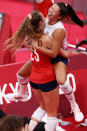 <p>Kelsey Robinson and Justine Wong-Orantes react after Team USA wins their first gold medal in Women's Volleyball. </p>