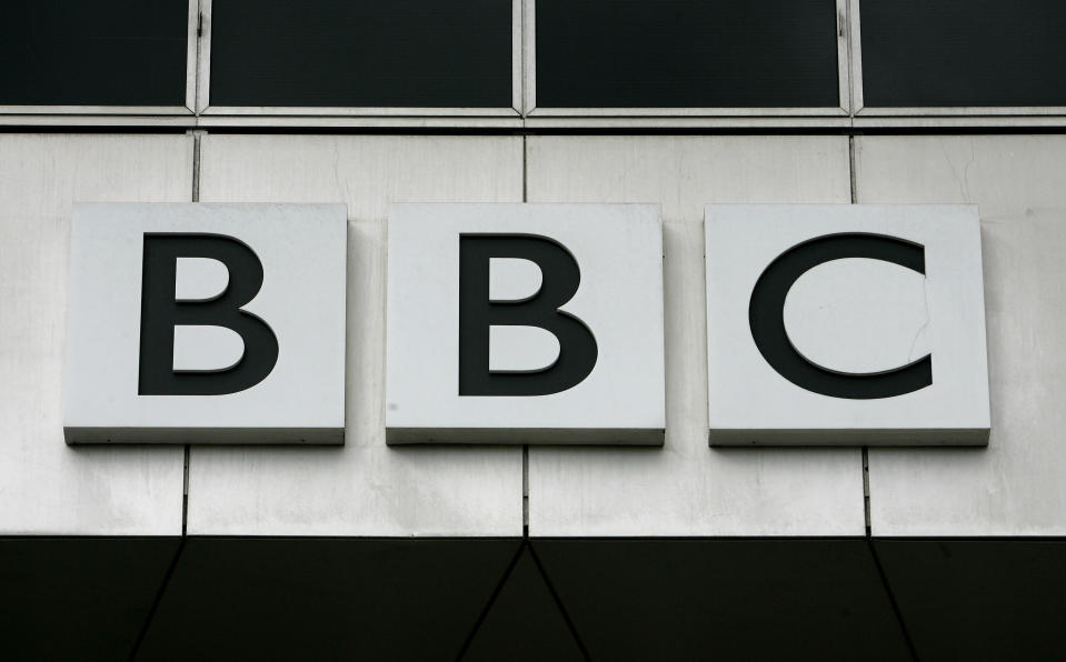 FILE - This Oct. 17, 2007, file photo, shows the BBC, British Broadcasting Corporation sign on their offices at White City in London. China has banned the BBC World News television channel from the few outlets where it could be seen in the country in possible retaliation after British regulators revoked the license of state-owned Chinese broadcaster CGTN. (AP Photo/Kirsty Wigglesworth, File)