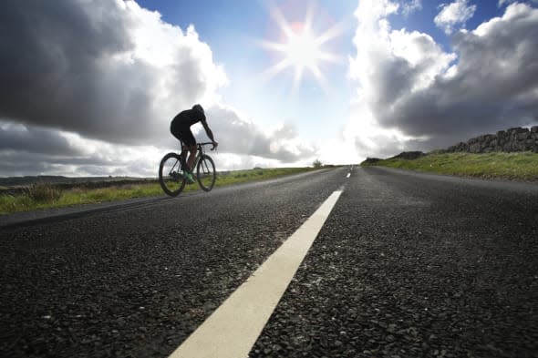 Cyclist on moorland road