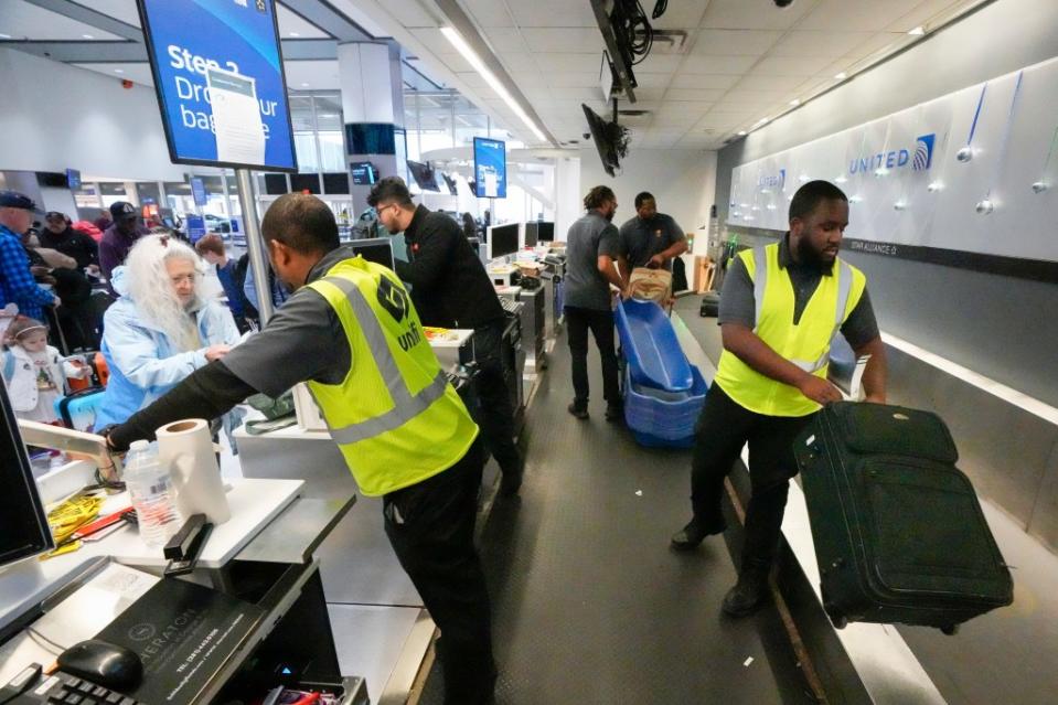 United’s economy-class passengers on domestic flights will be charged $5 more for a checked bag. AP