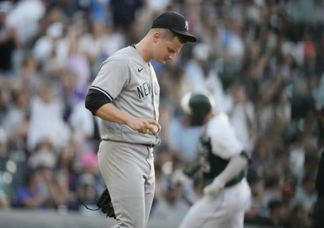 Stanton's 4th homer in 4 games powers Yankees over Rockies