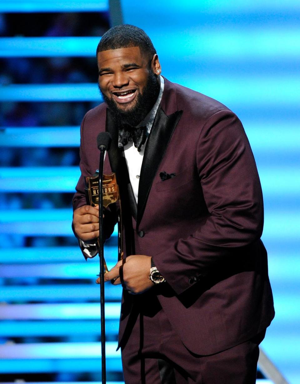 Sheldon Richardson of the New York Jets speaks after receiving the award for AP Defensive Rookie of the Year, at the third annual NFL Honors at Radio City Music Hall on Saturday, Feb. 1, 2014, in New York. (Photo by Evan Agostini/Invision for NFL/AP Images)