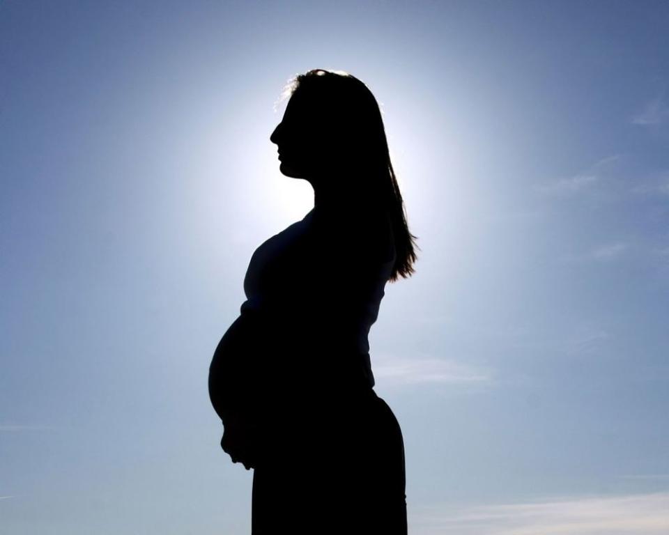 Silhouette of pregnant woman