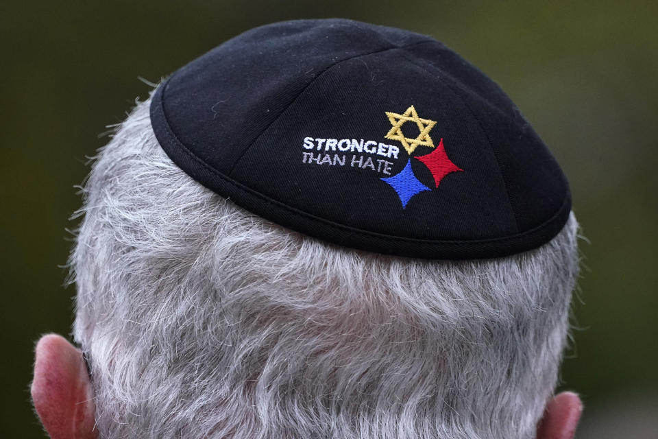 FILE - Tree of Life Synagogue Vice President Alan Hausman wears a Stronger Than Hate yarmulke during a Commemoration Ceremony in Schenley Park, in Pittsburgh's Squirrel Hill neighborhood, on Oct. 27, 2021. The head of security for Pittsburgh's Jewish community said Friday, May 12, 2023, there has been an “uptick in hate speech” on the internet, but no specific threats, in the early stages of the trial of the man accused of killing 11 worshippers at a synagogue here in 2018. (AP Photo/Gene J. Puskar, File)