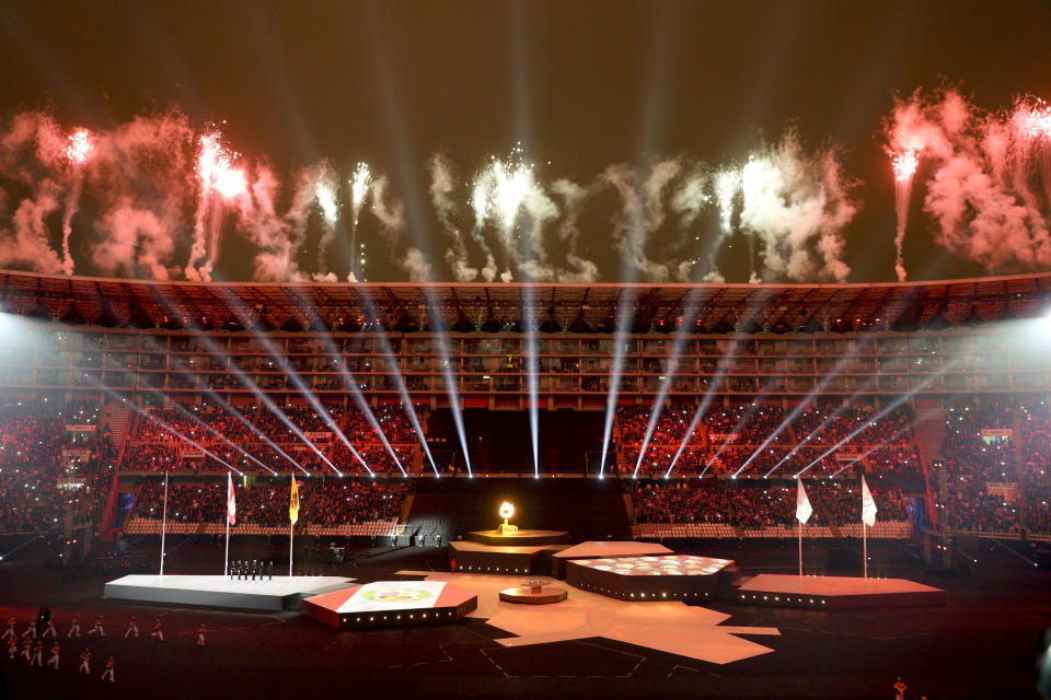 The Pan American flame is on the center stage during the closing ceremony of the Pan American Games at the National stadium in Lima, Peru, Sunday, Aug. 11, 2019. (AP Photo/Martin Mejia)