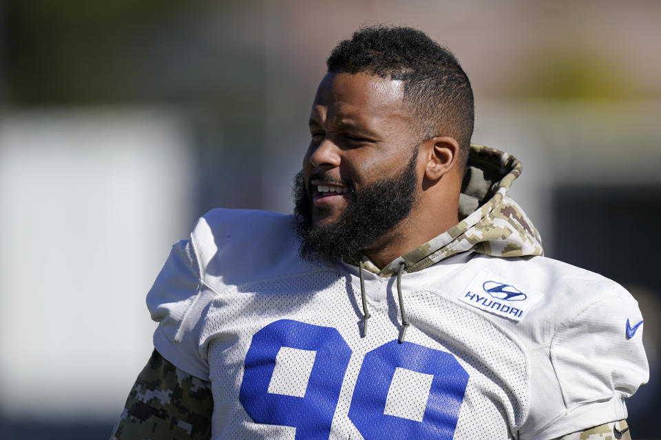 Los Angeles Rams defensive end Aaron Donald stands on the field during an NFL football practice Friday, Jan. 28, 2022, in Thousand Oaks, Calif., ahead of the NFC championship game against the San Francisco 49ers on Sunday. (AP Photo/Mark J. Terrill)