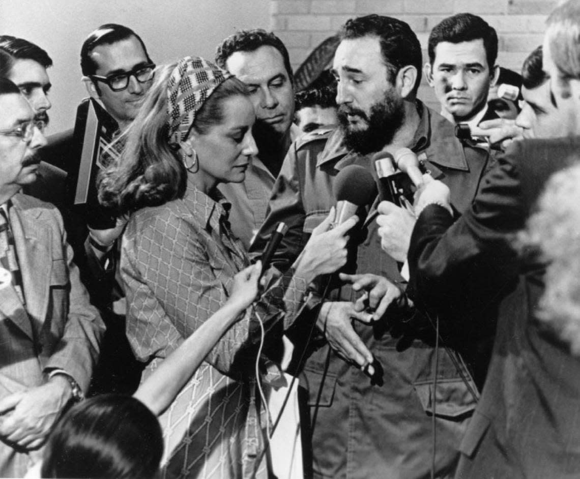 Fidel Castro, center right, responds to a question from then NBC reporter Barbara Walters, center left, during a news conference granted to members of the U.S. press covering Sen. George McGovern’s trip to Cuba, in Havana, in a file photo from May 7, 1975.