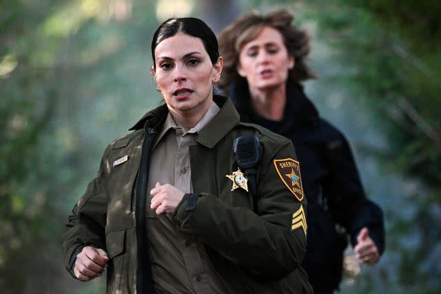<p>Sergei Bachlakov/CBS</p> Morena Baccarin and Diane Farr on 'Fire Country.'