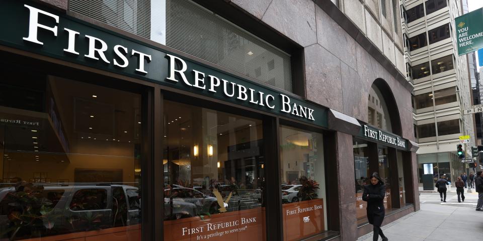 A pedestrian walks by the First Republic Bank headquarters on March 13, 2023 in San Francisco, California.