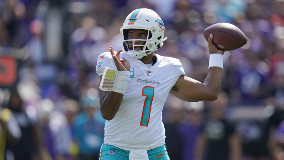 Miami Dolphins quarterback Tua Tagovailoa (1) aims a pass during the first half of an NFL football game against the Baltimore Ravens, Sunday, Sept. 18, 2022, in Baltimore. (AP Photo/Julio Cortez)