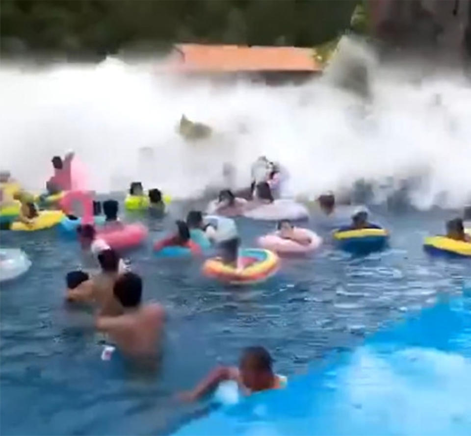 Tourists in swimming rings were flipped upside down, while others were dumped onto the land. Source: Newsflare