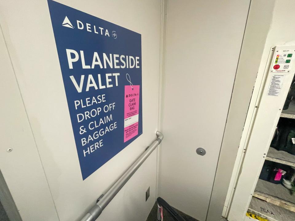 The pick up area for the valet checked luggage on a Delta flight.