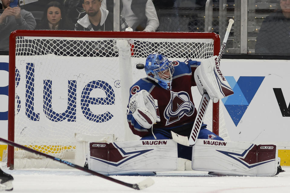 Colorado Avalanche goaltender Pavel Francouz can't stop a shot by Boston Bruins' Trent Frederic for a goal during the third period of an NHL hockey game Saturday, Dec. 3, 2022, in Boston. (AP Photo/Winslow Townson)