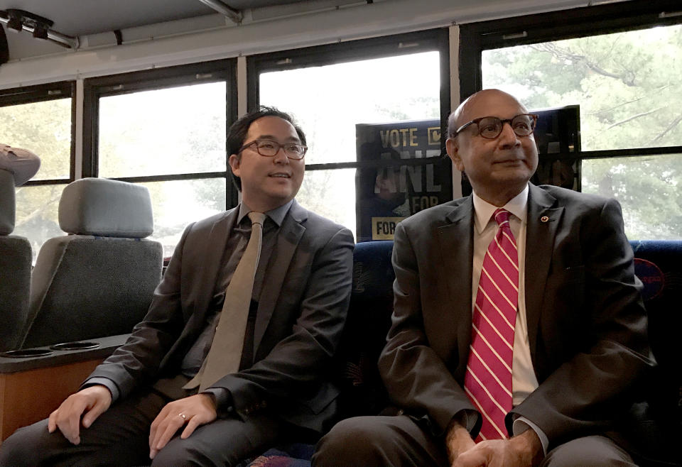 Andy Kim and Gold Star father Khizr Khan relax aboard the Bus for Progress. (Photo: Andrew Romano/Yahoo News)