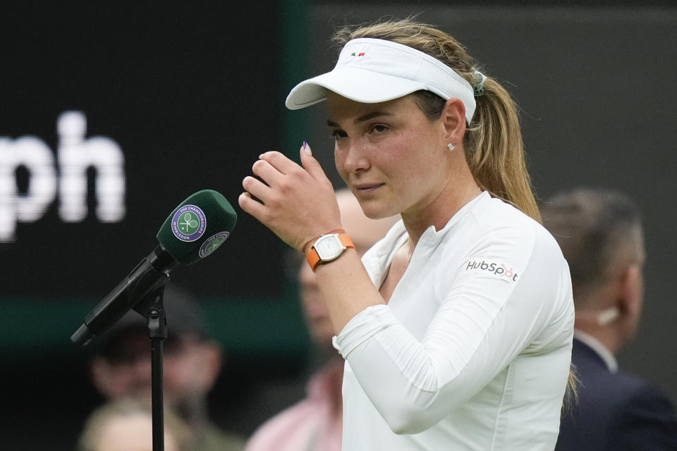 Donna Vekic of Croatia reacts after defeating Lulu Sun of New Zealand in their quarterfinal match at the Wimbledon tennis championships in London, Tuesday, July 9, 2024. (AP Photo/Mosa'ab Elshamy)